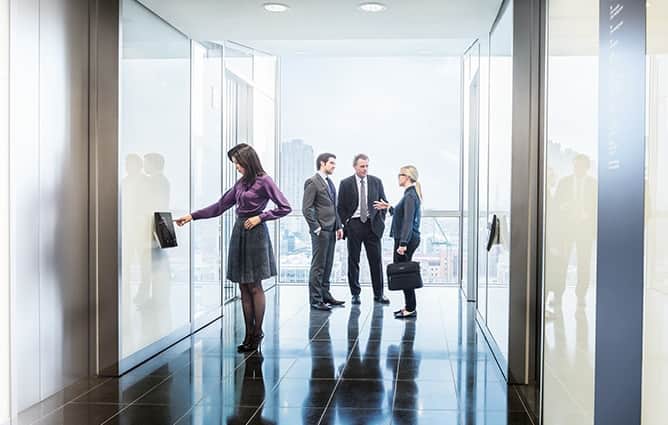 Woman waiting for elevator